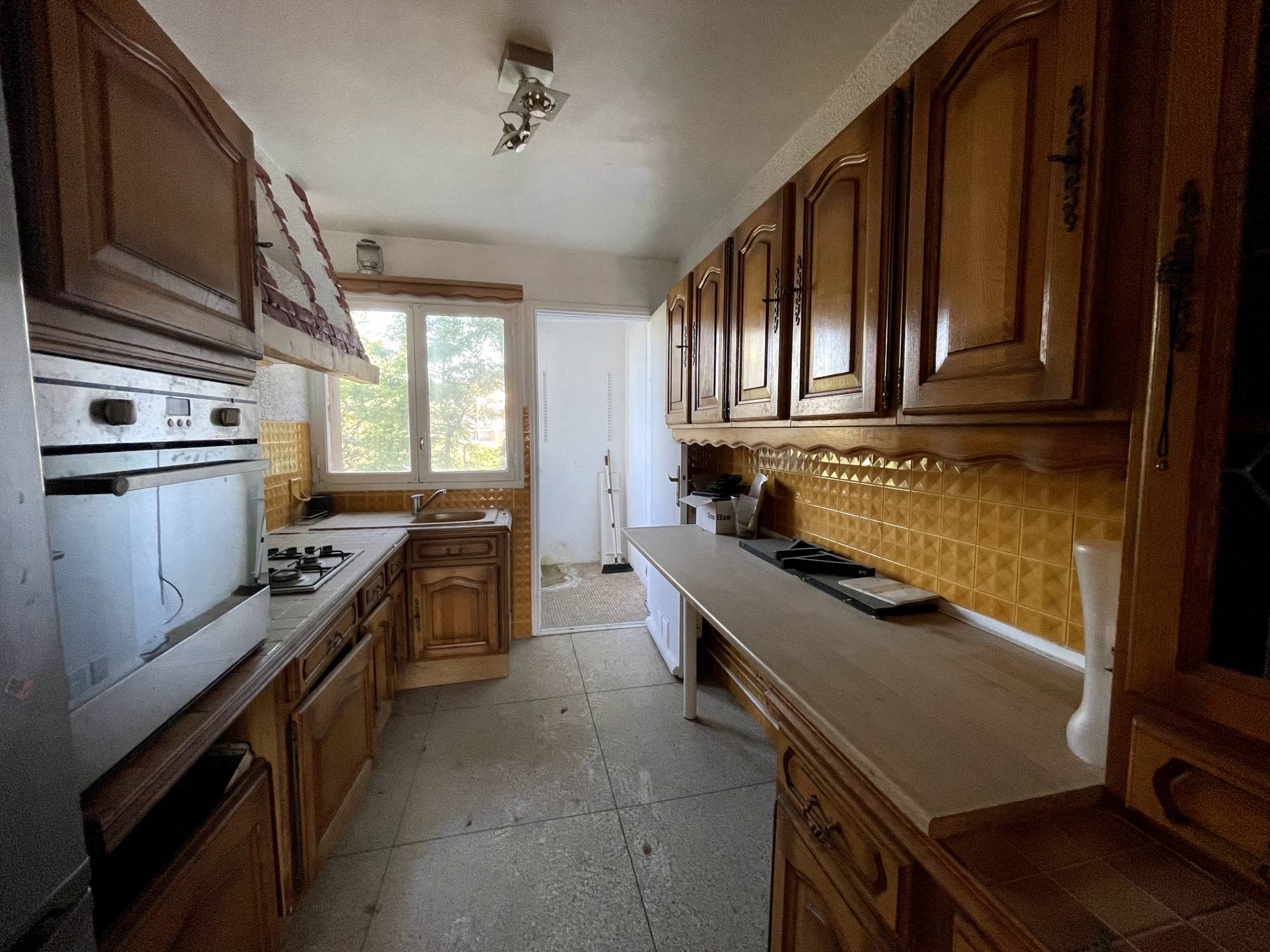 cuisine A vendre appartement 3 pièces de 59 m² avec balcon, loggia, cave et place de parking privative Saint Pierre / Blancarde 13005 Marseille